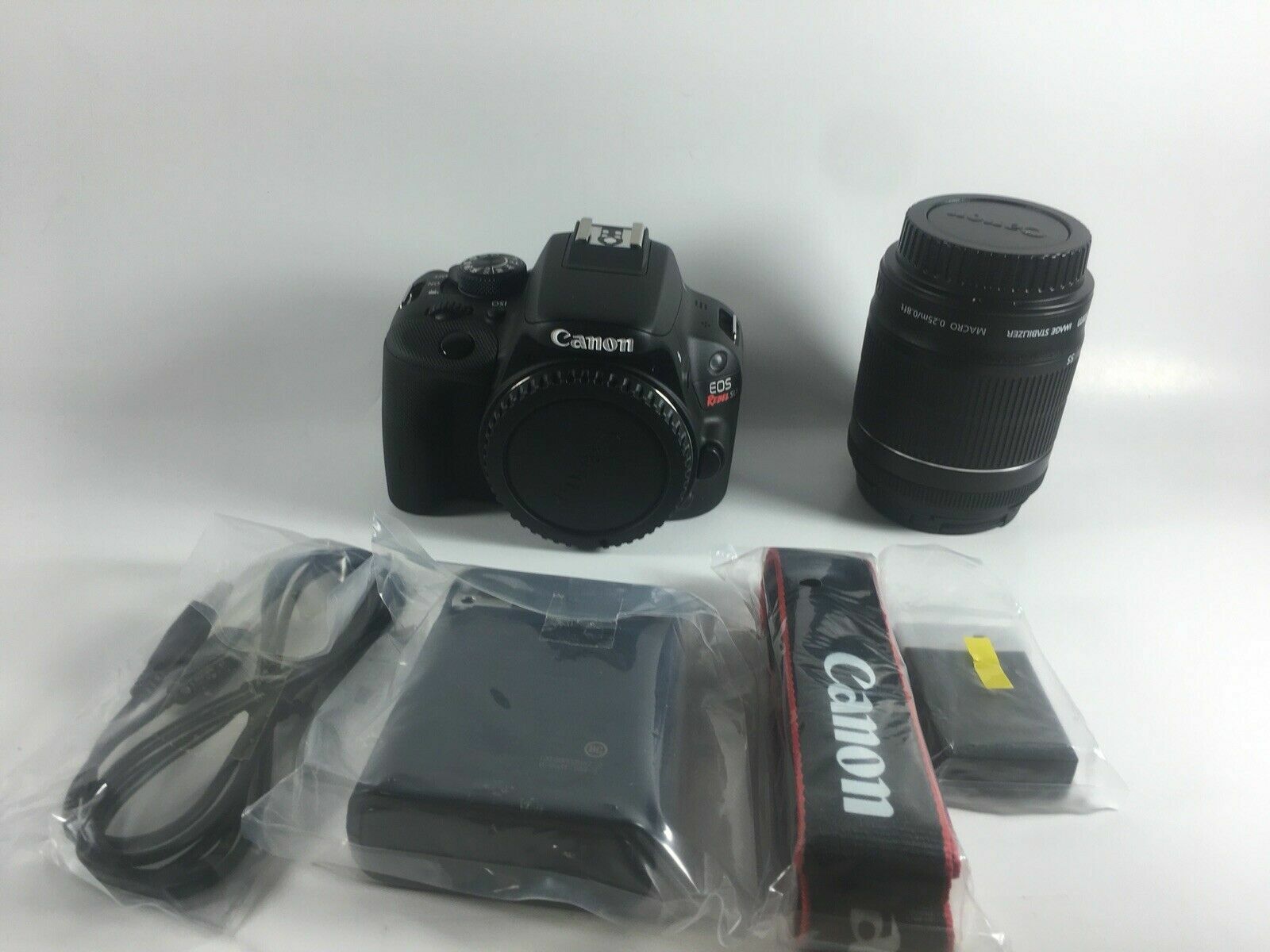 Black Canon EOS Rebel SL1 18 MP Digital SLR Camera  (Kit w/ Canon EF-S 18-55mm) 