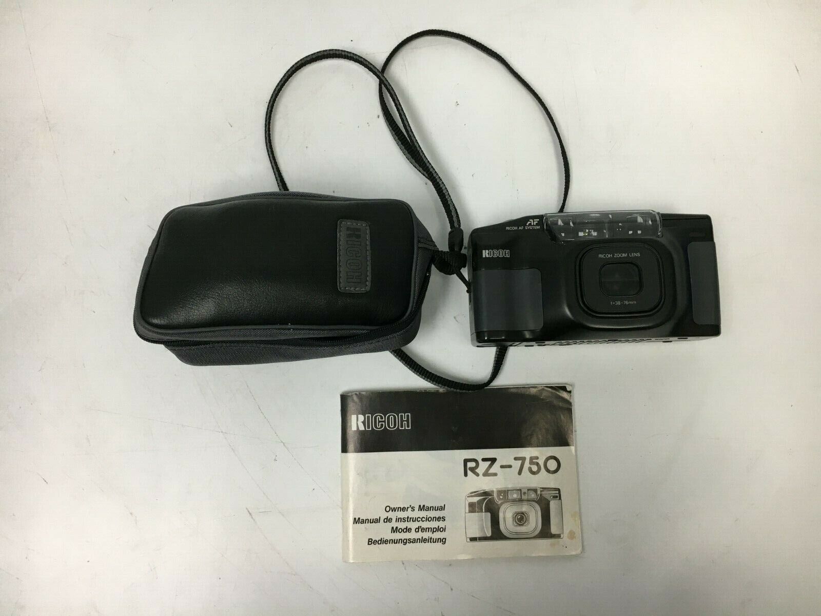 Ricoh RZ-750 DATE 35mm Point and Shoot Camera with 38-75mm Zoom Lens and Case
