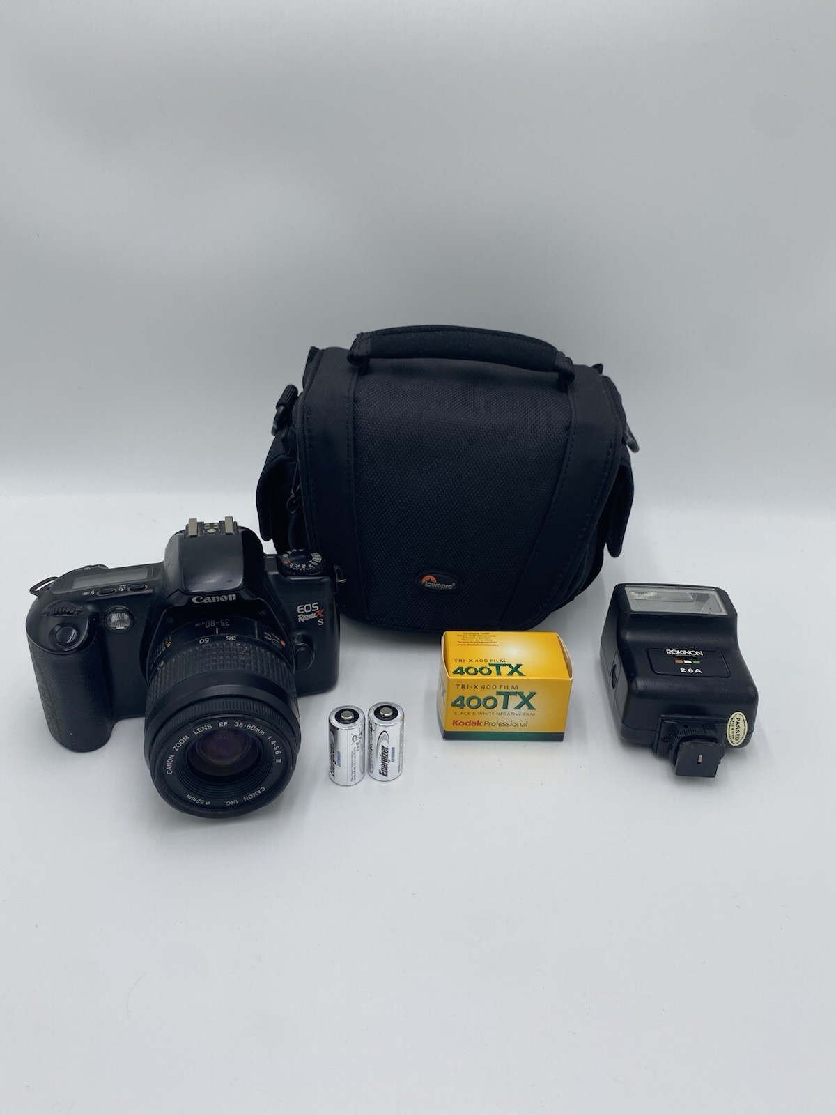 Canon EOS Rebel XS 35mm SLR Film Camera 35-80mm Lens + Extras TESTED